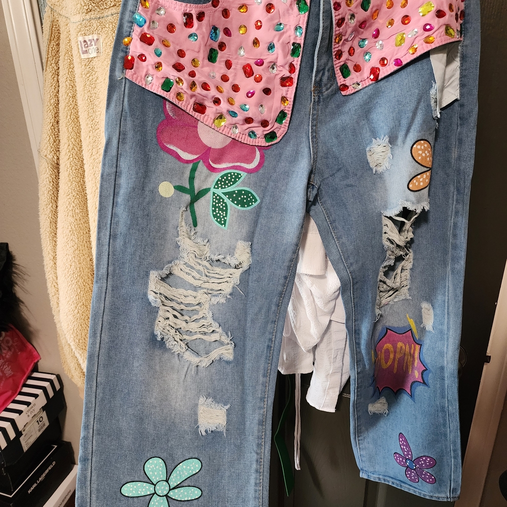 Embellished Blue Jeans with Floral and Graphic Accents